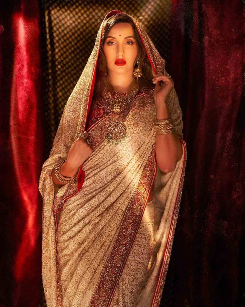 Nora Fatehi in Expensive Red Saari